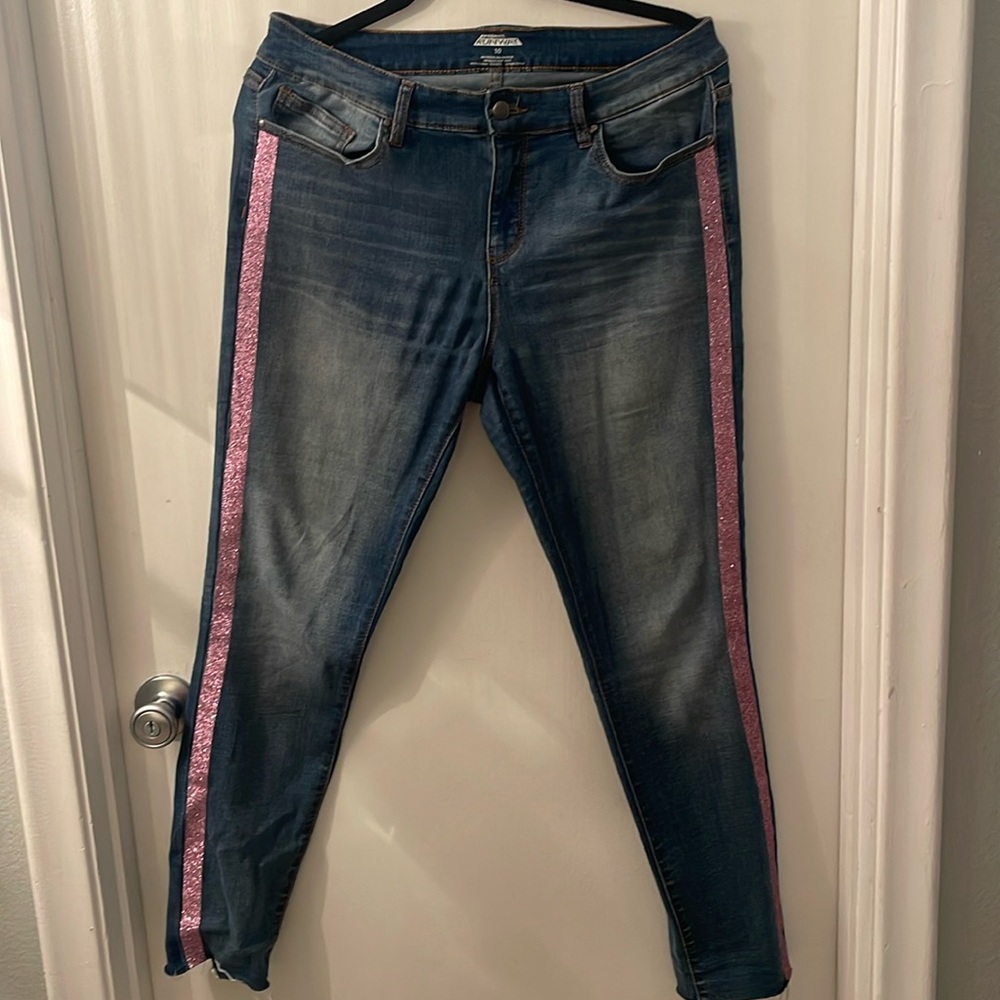 Jeans with pink glitter stripe on legs